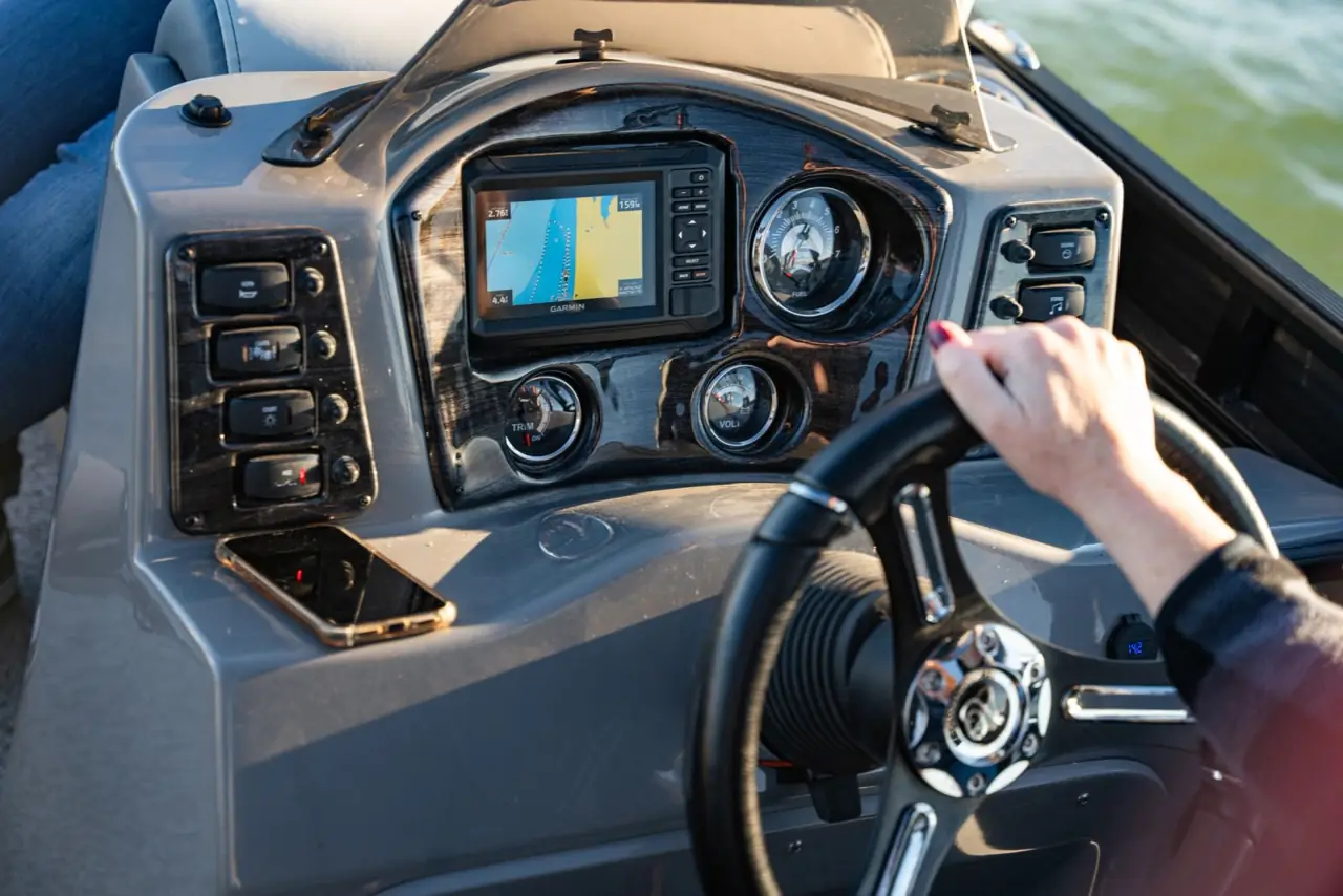 The side console helm with Garmin chartplotter and rocker switches