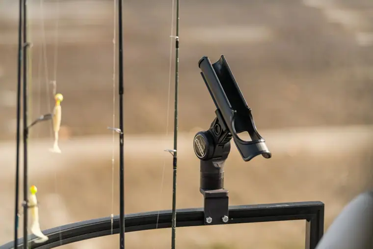 Rod holder mounted in the QwikTrak rail