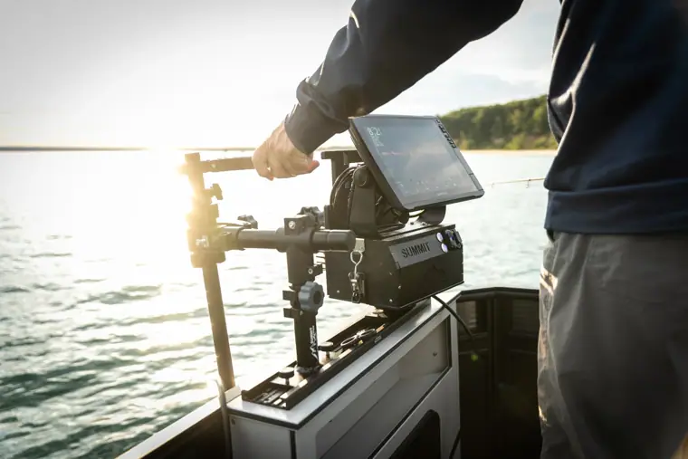 Adjusting the forward sonar mount at the bow